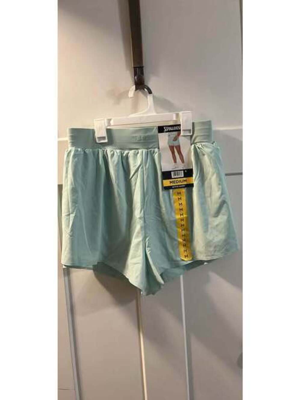 Spalding light green women’s active short size medium
